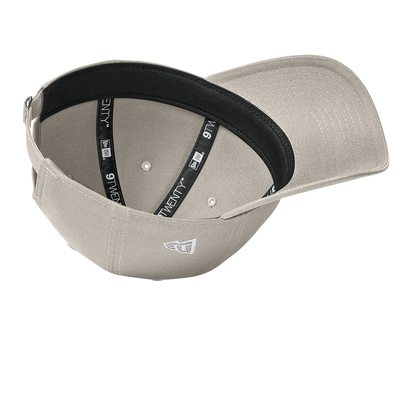 underside of tan baseball cap 